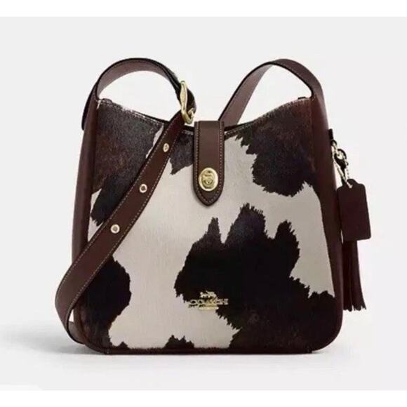 Coach Handbags - Stylish Coach Hadley Cow Print Convertible Crossbody Bag